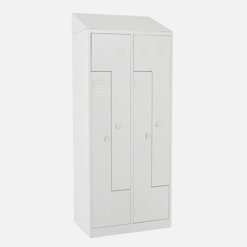 Taquilla en L 2 cuerpos gris con un techo inclinado y puertas cerradas